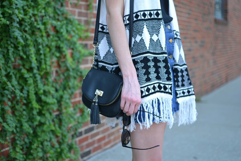 fringe sweater, jean skirt, black tassle purse