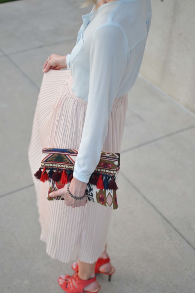 blush pleated midi skirt, light blue blouse, red lace up heels
