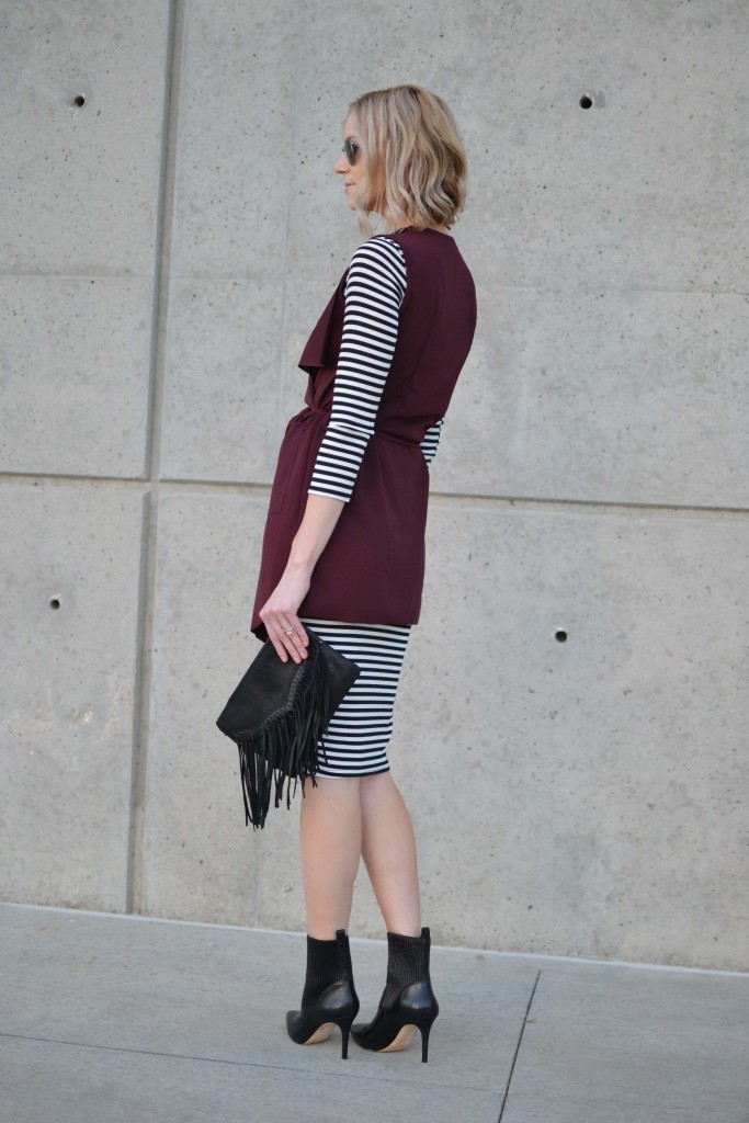 striped dress, black boots, burgundy vest