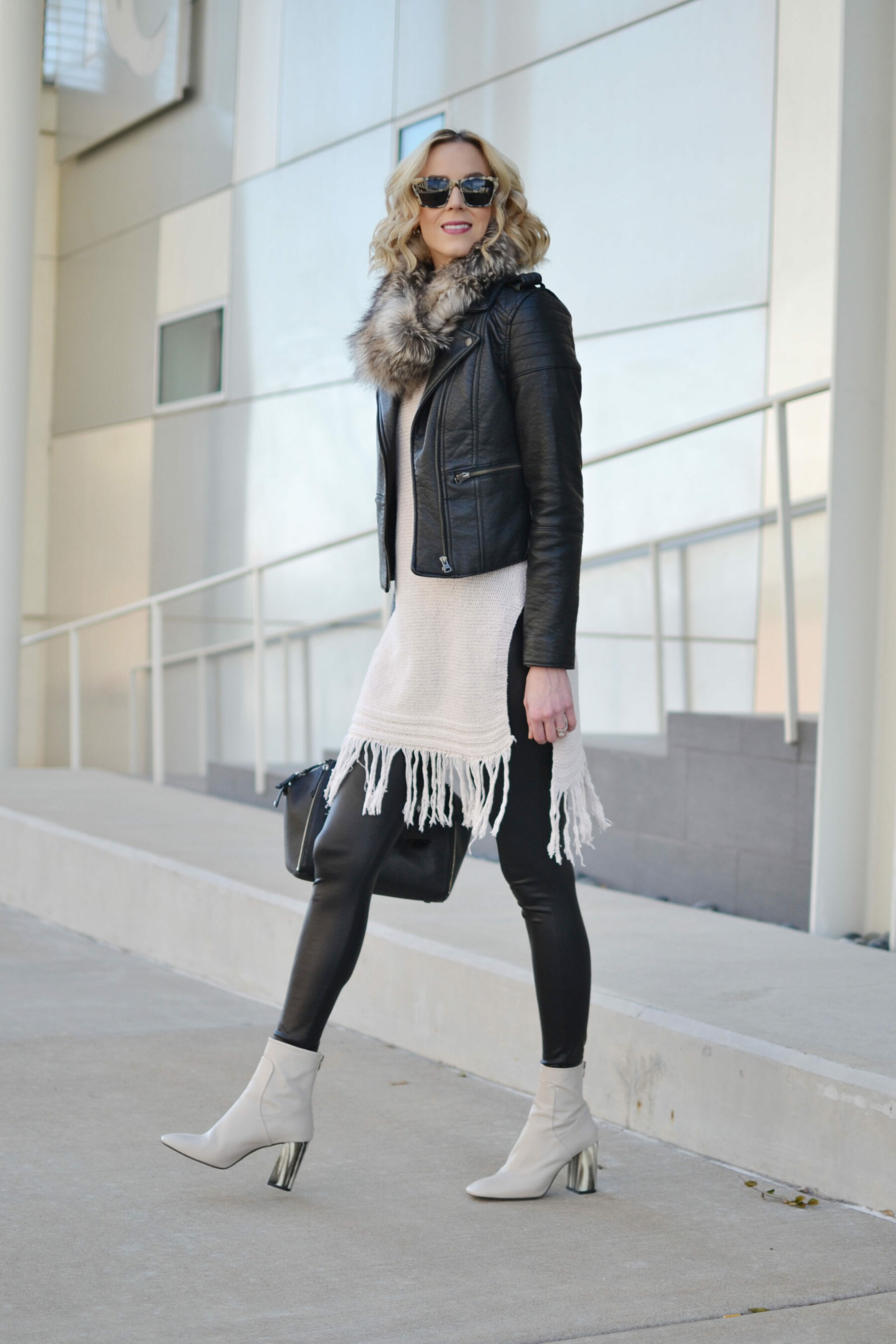 fringe hem tunic sweater, leather jacket, faux fur scarf, leather leggings,  cream mod style booties - Straight A Style