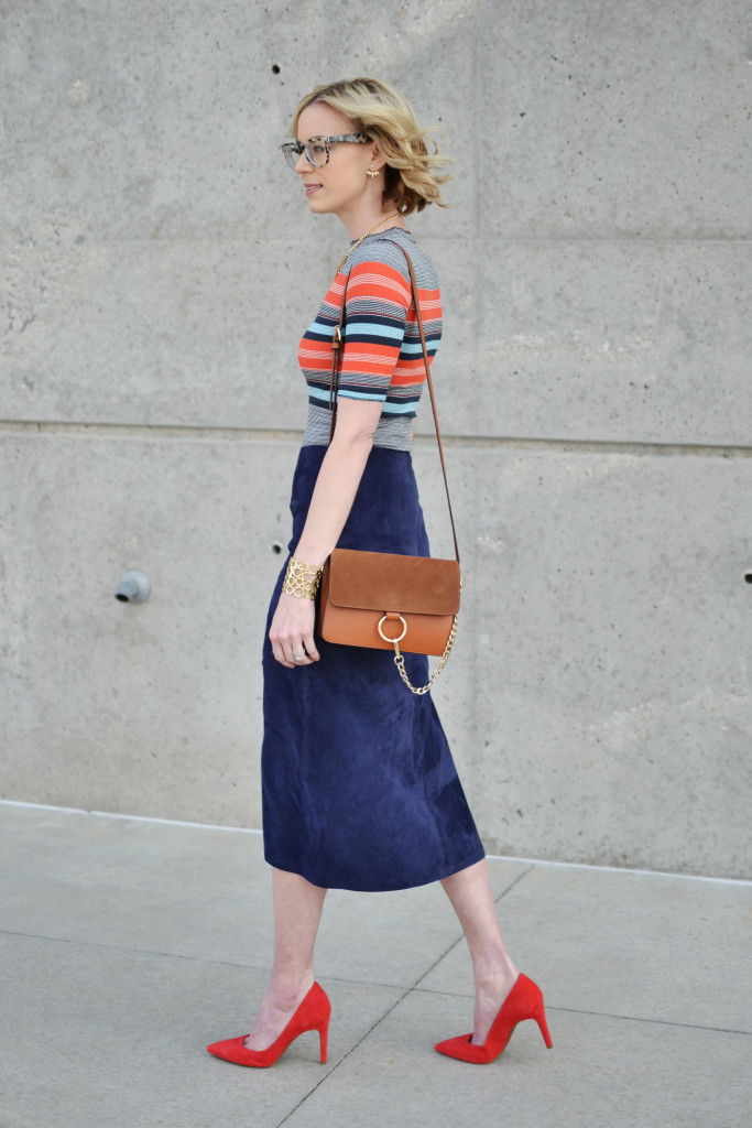 navy blue suede pencil skirt, striped top, red heels, chloe dupe bag