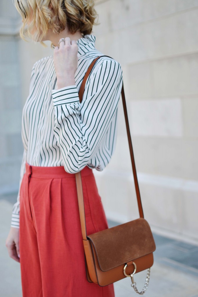 Why wear regular pants when you can make a statement? These red wide leg pants from Ann Taylor are classic and functional, especially with a striped blouse.