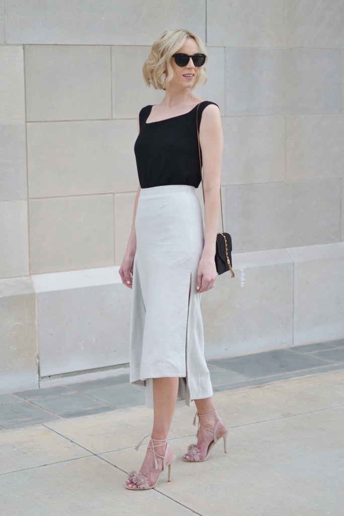 classic pieces with BYOND, blush pom pom heels, black top, grey suede skirt, asymmetrical 