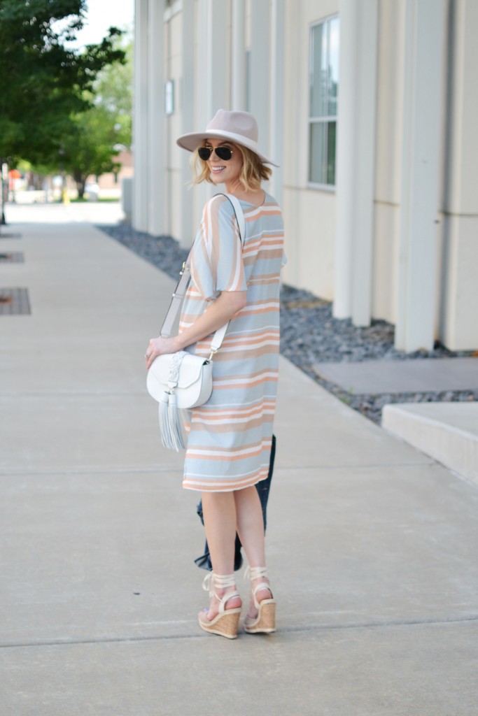 pastel striped dress, pale pink hat, summer outfit, lace up wedges, white tassel bag, jean jacket