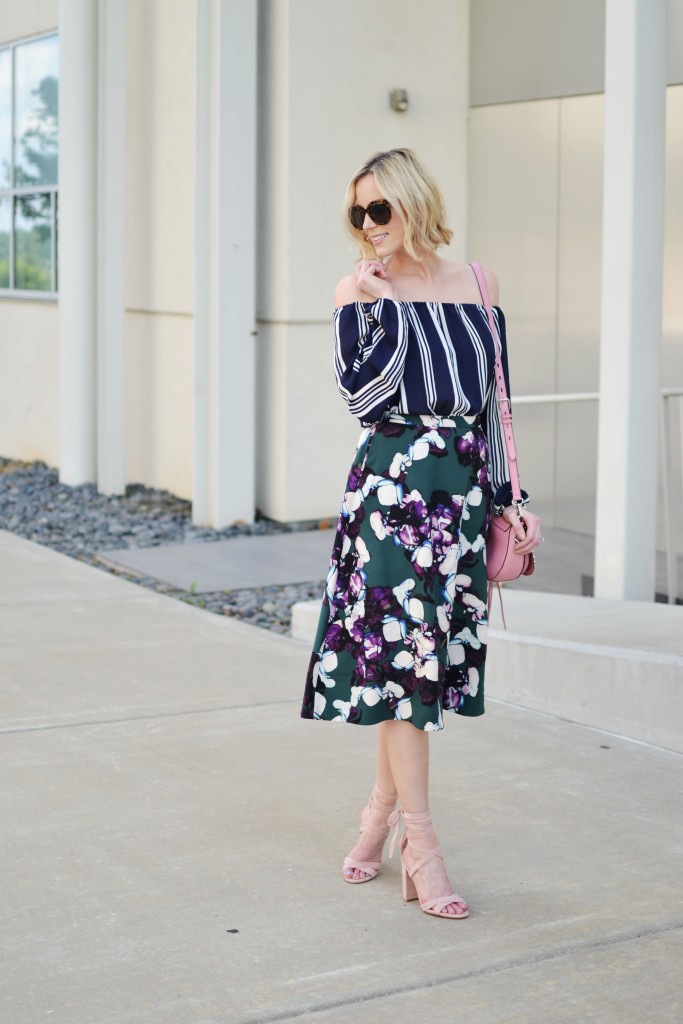 A classic mix of floral and stripes changed up a little by adding a trendy off the shoulder top and pink accents