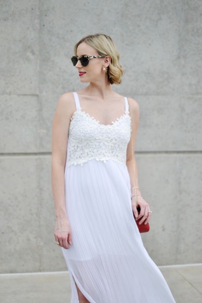 French connection white pleated maxi dress, ref lace up fringe heels, red bag, star earrings