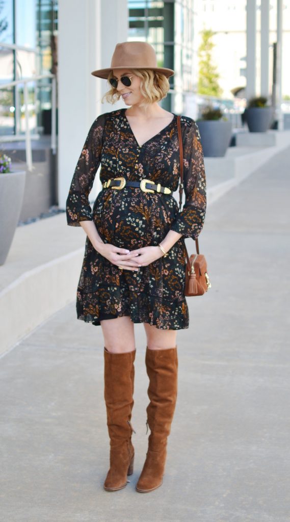bohemian floral dress with over the knee boots and a hat, black and tan, fall outfit idea, stylish maternity outfit