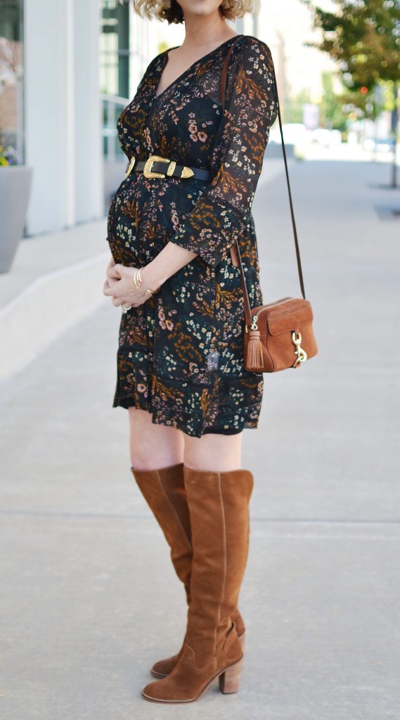 bohemian floral dress with over the knee boots and a hat, black and tan, fall outfit idea, stylish maternity outfit