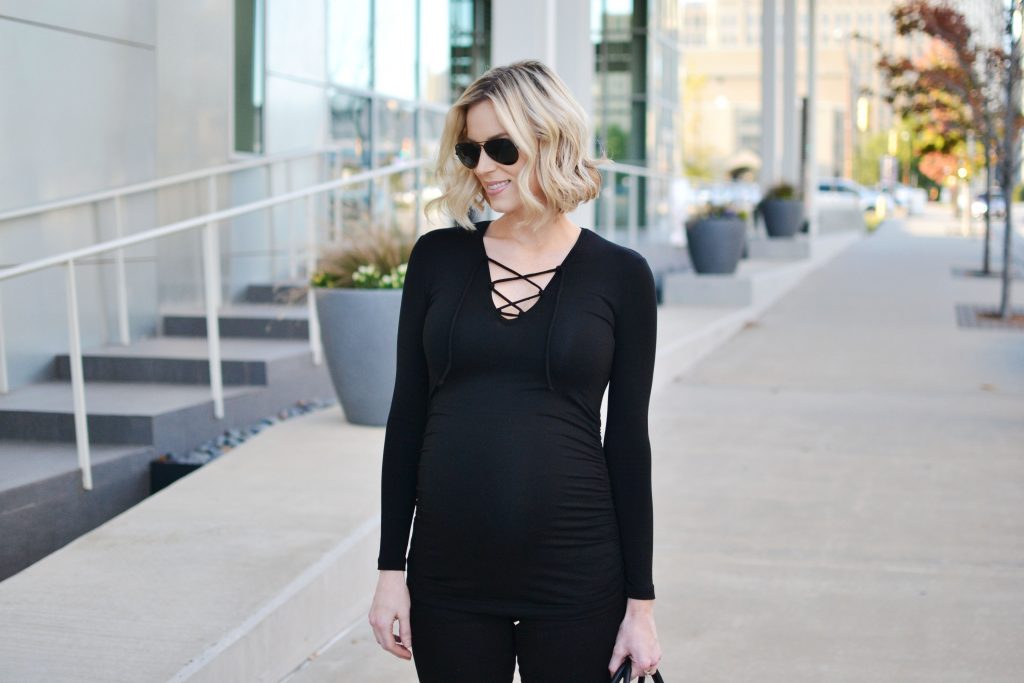 all black outfit, lace up top, black jeans, stylish maternity outfit, fall outfit idea