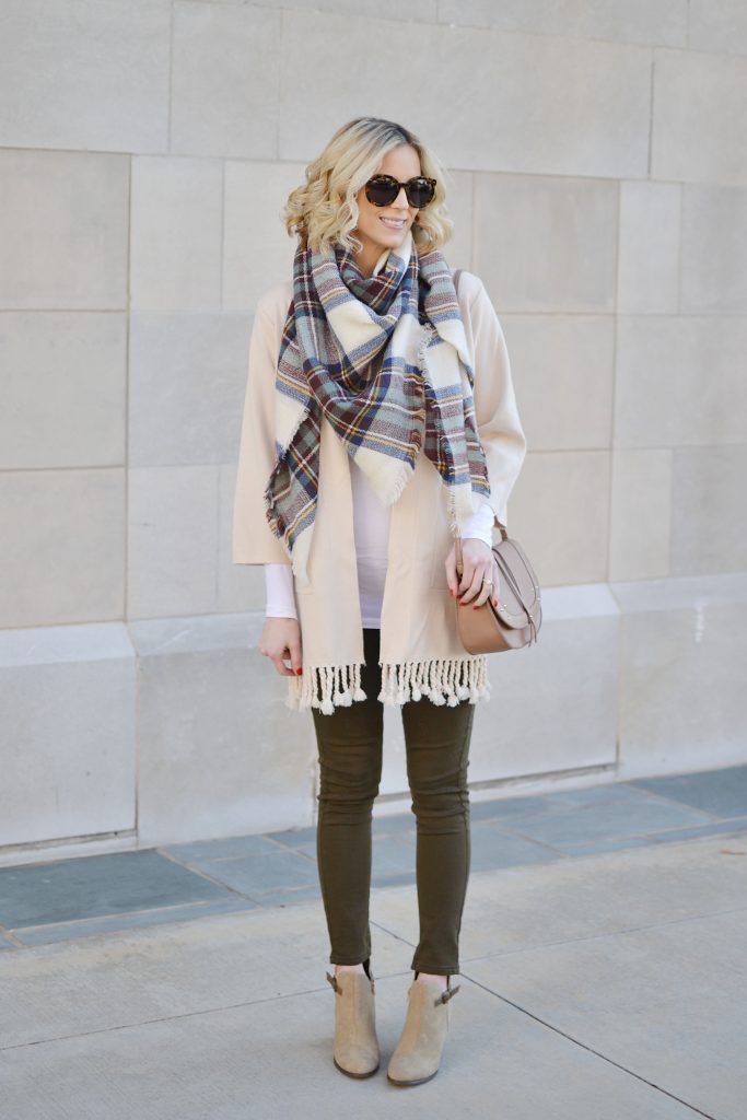 casual fall outfit idea, olive green skinny jeans, fringe cardigan, blanket scarf, Restricted Shoes booties
