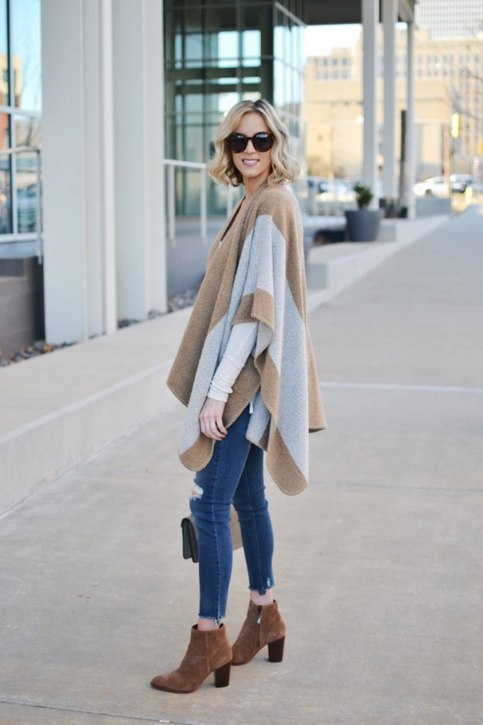 affordable trendy denim, poncho, thermal, distressed denim, boots, casual outfit idea