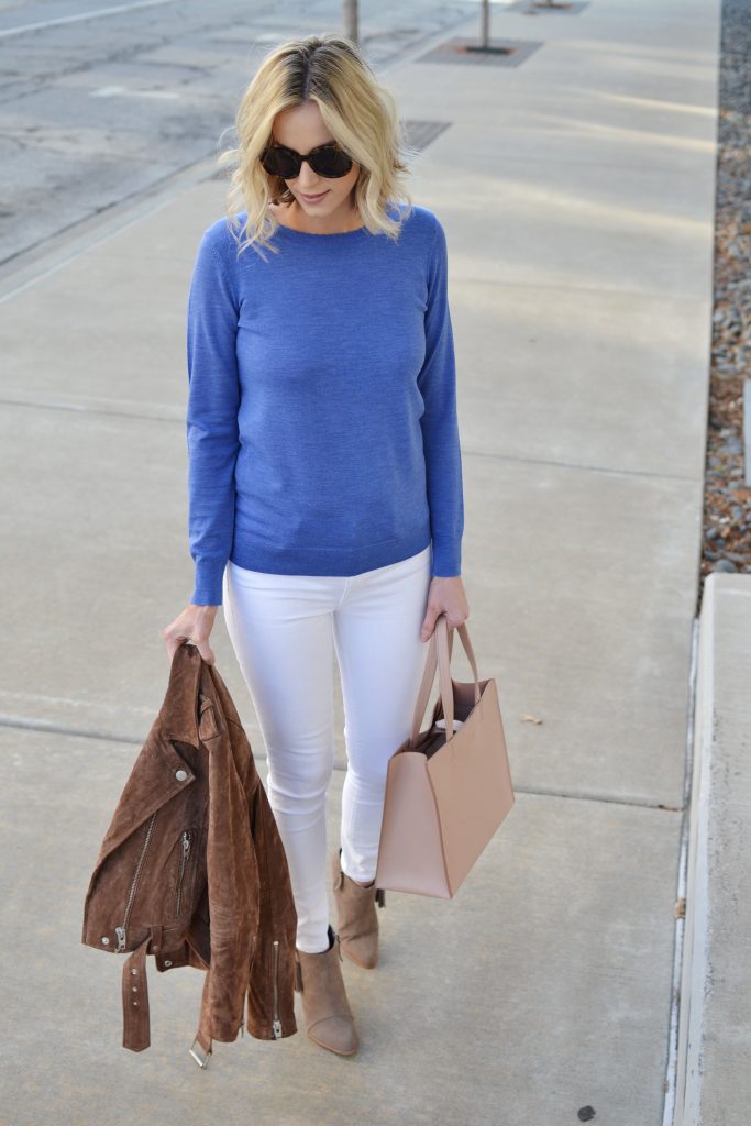 how to style a blue top - blue sweater, white jeans, tan suede moto jacket, tan ankle boots, tan tote