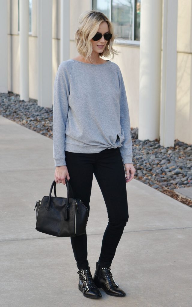 knotted grey sweatshirt, black jeans, buckle boots, casual jeans outfit