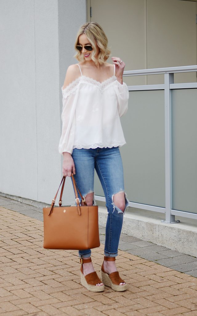 WAYF white cold shoulder blouse, distressed jeans, Marc Fisher wedges, Tory burch tote