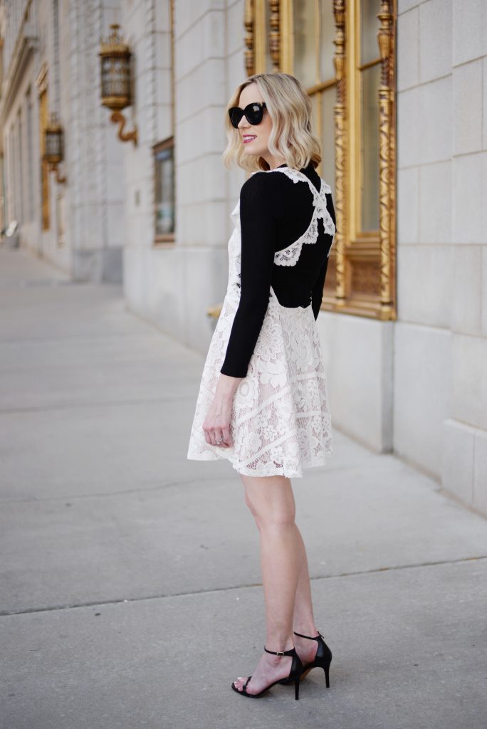 styling a backless dress, backless white lace dress, black tee