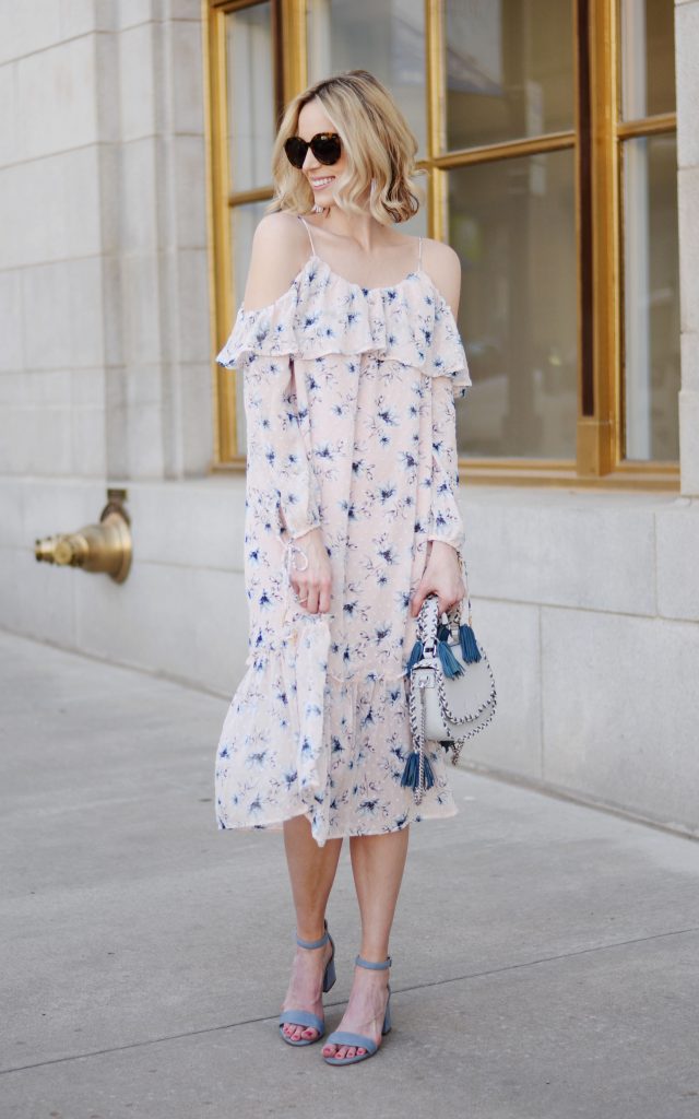 Easter outfit idea, blush off the shoulder floral dress, blue sandals, Rebecca Minoff tassel bag