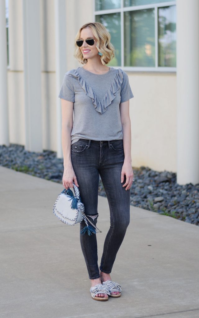 monochrome grey casual outfit with blue Rebecca Minkoff tassel bag and bow slides