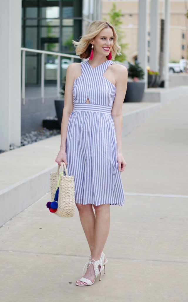 blue and white cutout dress, pink tassel earrings, straw bag, white heels
