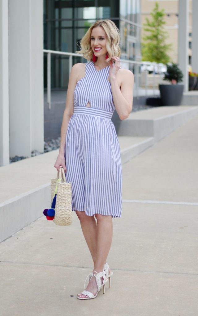 blue and white cutout dress, pink tassel earrings, straw bag, white heels