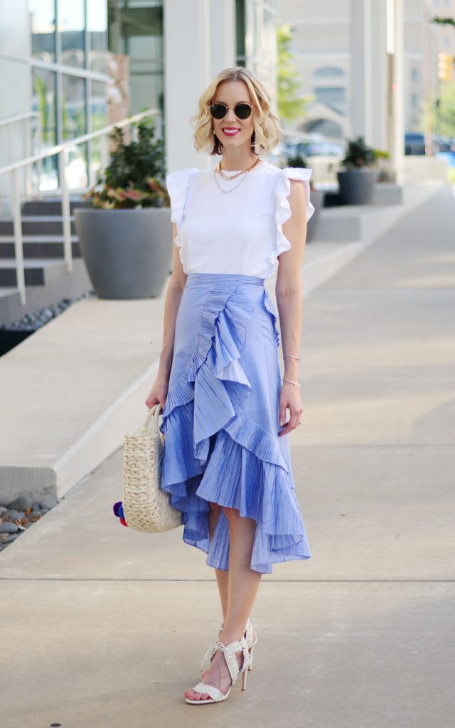 ruffles on ruffles, blue tiered ruffle skirt, white ruffle sleeve top, straw bag, summer outfit