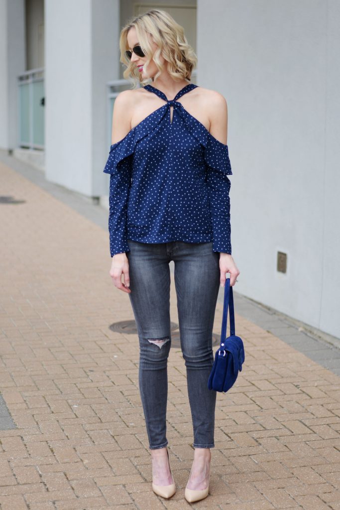 cutest going out top with grey jeans and nude heels, navy blue cold shoulder halter top