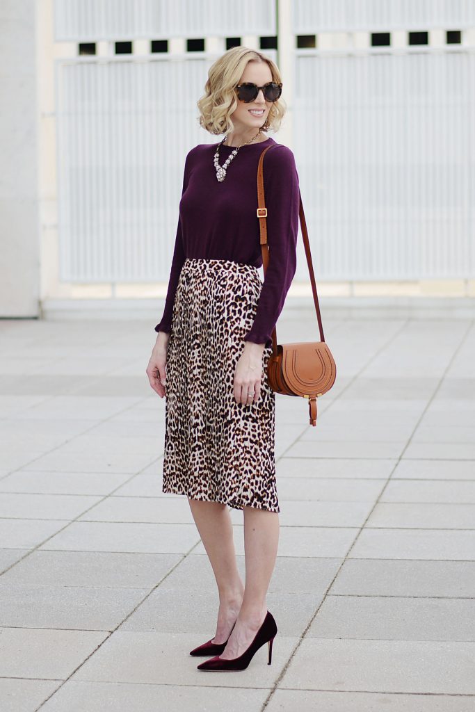 burgundy sweater with ruffle hem sleeves, leopard midi skirt, burgundy velvet heels, fall work outfit idea