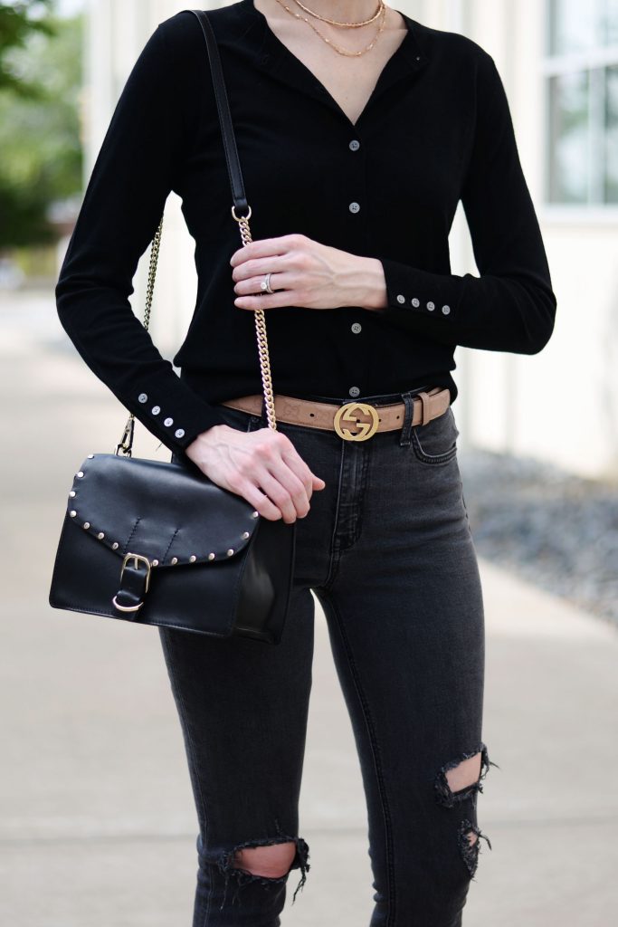 how to wear a cardigan as a top, all black outfit, gucci belt, distressed black jeans, black cardigan