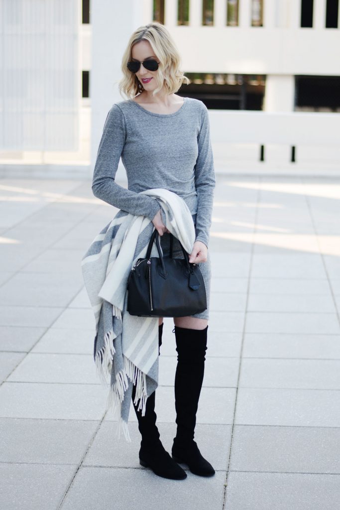 grey bodycon dress with over the knee boots and draped poncho