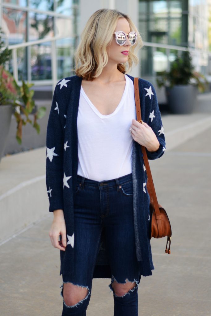 mirrored sunglasses with a white t-shirt and star cardigan