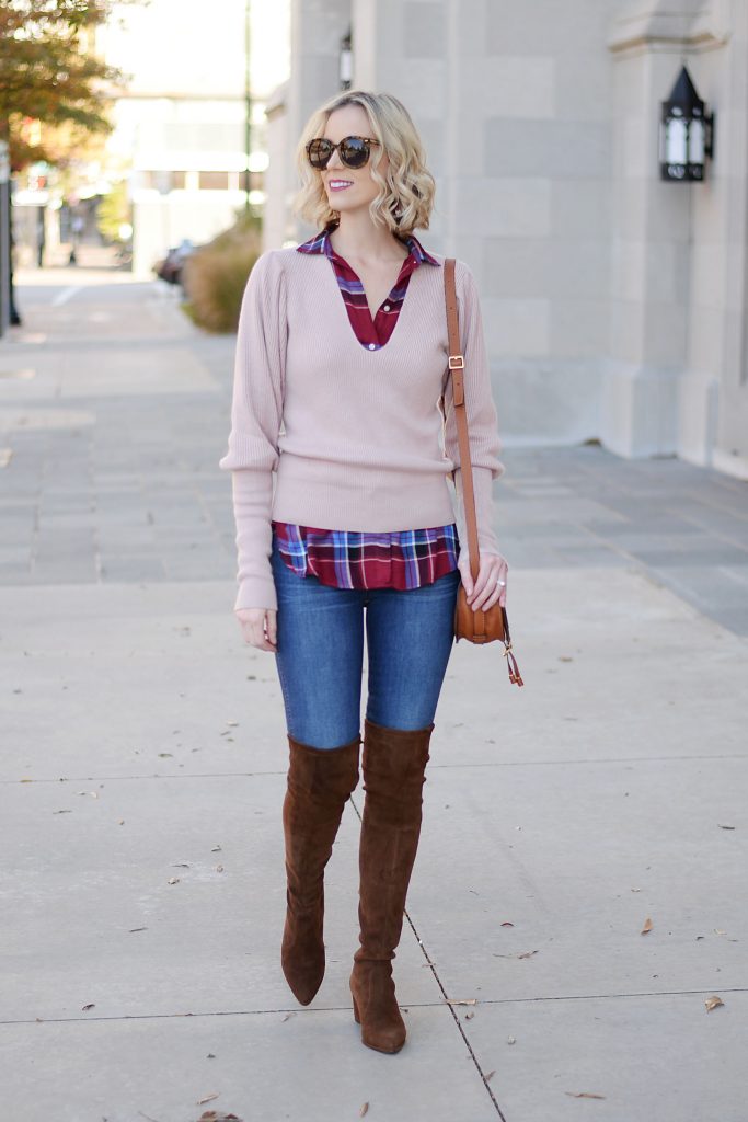 sweater and plaid top layered together with jeans and brown over the knee boots
