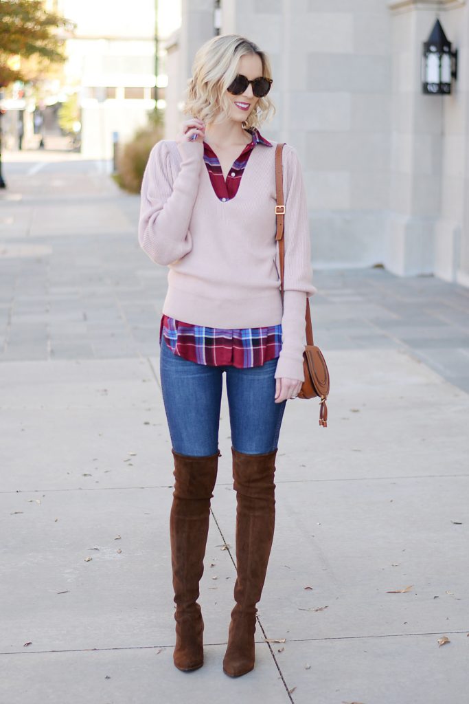 burgundy and pink tops layered with brown over the knee boots and jeans