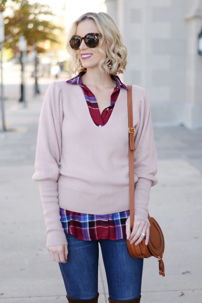 rose pink sweater over burgundy plaid top with jeans