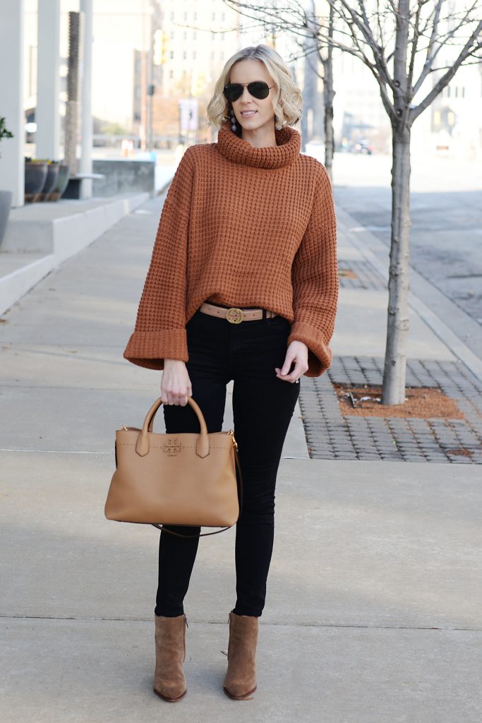 cozy sweater with jeans and boots