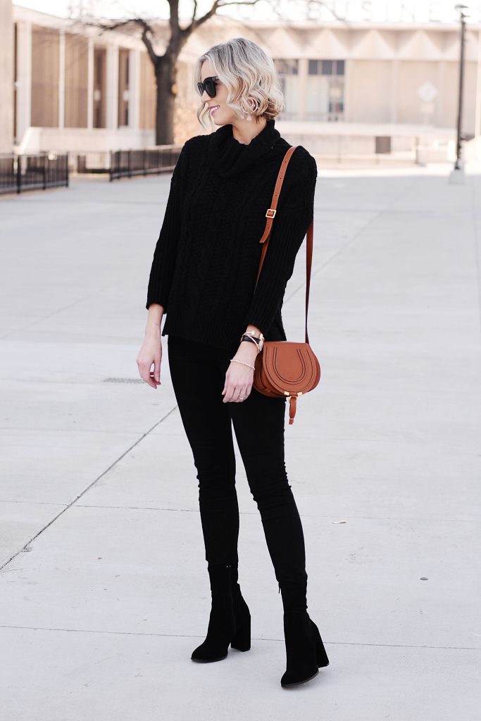 the most slimming outfit - black jeans with black sock booties to make a long leg line
