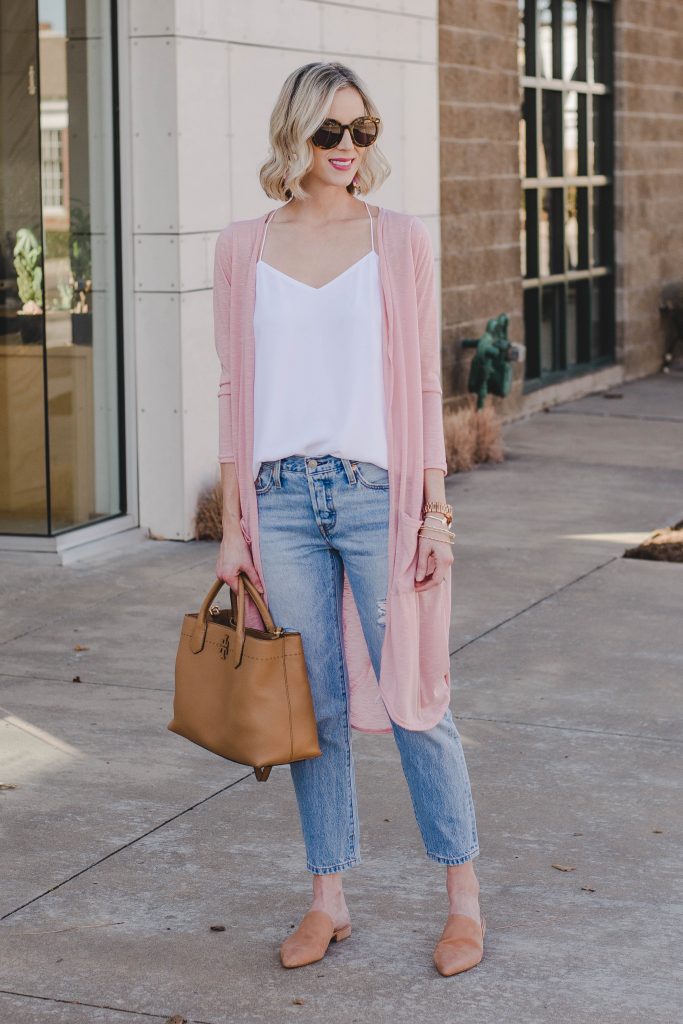 light pink duster cardigan, white camisole, light wash distressed jeans, tan slide mule shoes