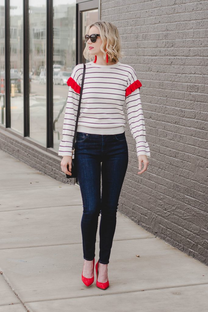 cute outfit idea for early spring, striped top with dark skinny jeans and heels