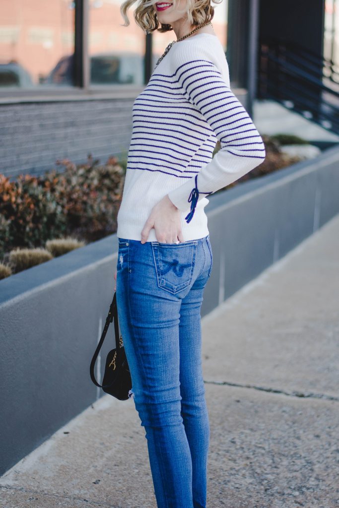 striped sweater with bow detail at arm