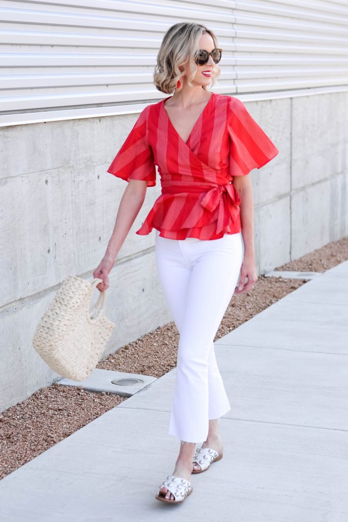 white cropped flares with red fitted peplum top