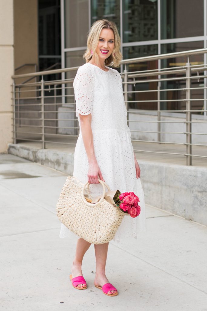 beautiful spring outfit with white dress, pink roses, and pink shoes