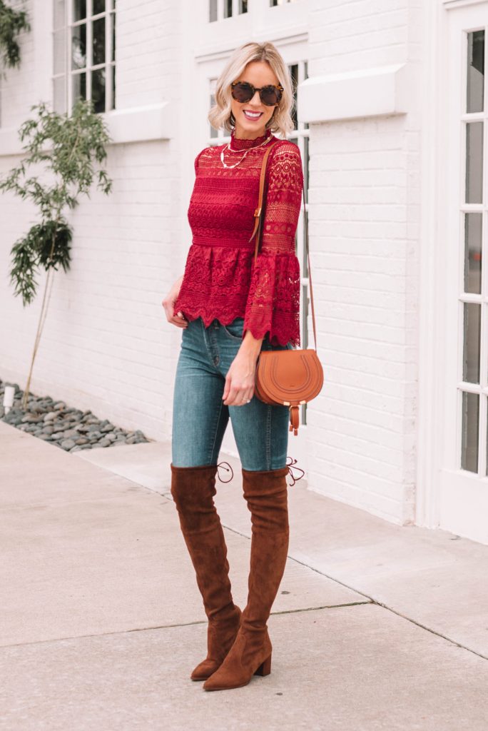 beautiful deep berry colored lace peplum blouse paired with brown suede over the knee boots