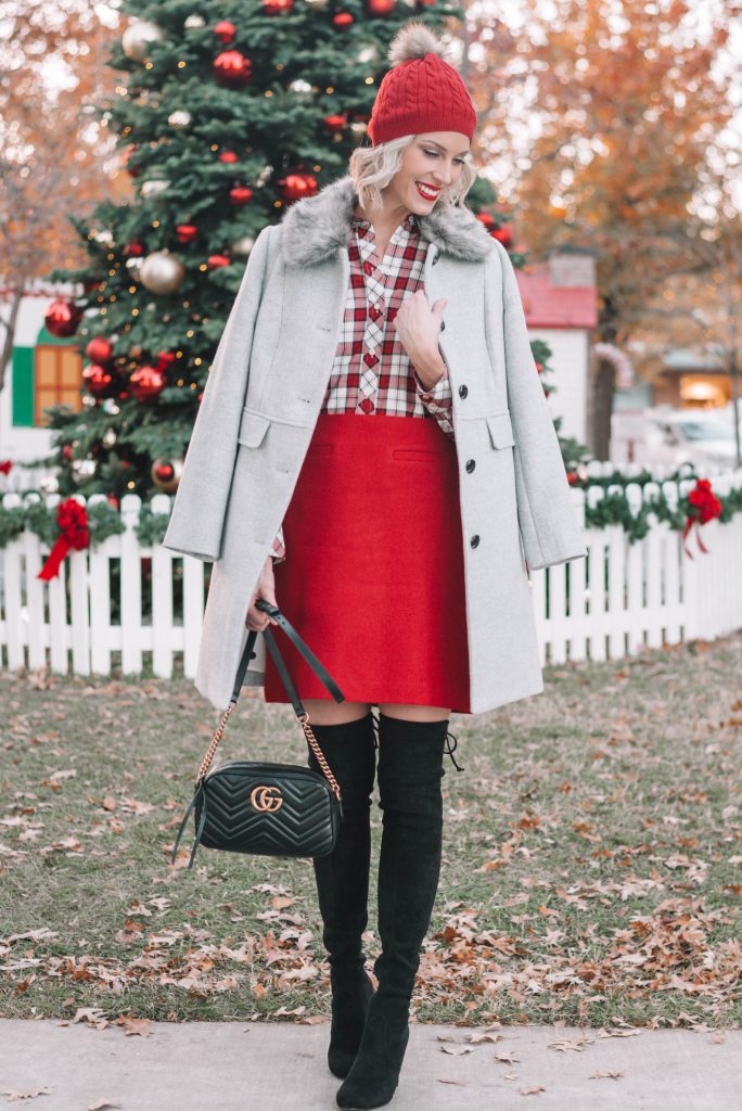 festive holiday outfit, red skirt, grey coat, plaid shirt