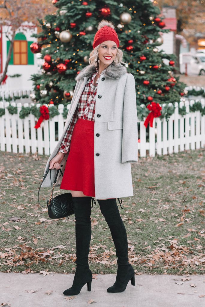 red a-line skirt, red and white plaid button up skirt, grey fur collar jacket, black over the knee boots