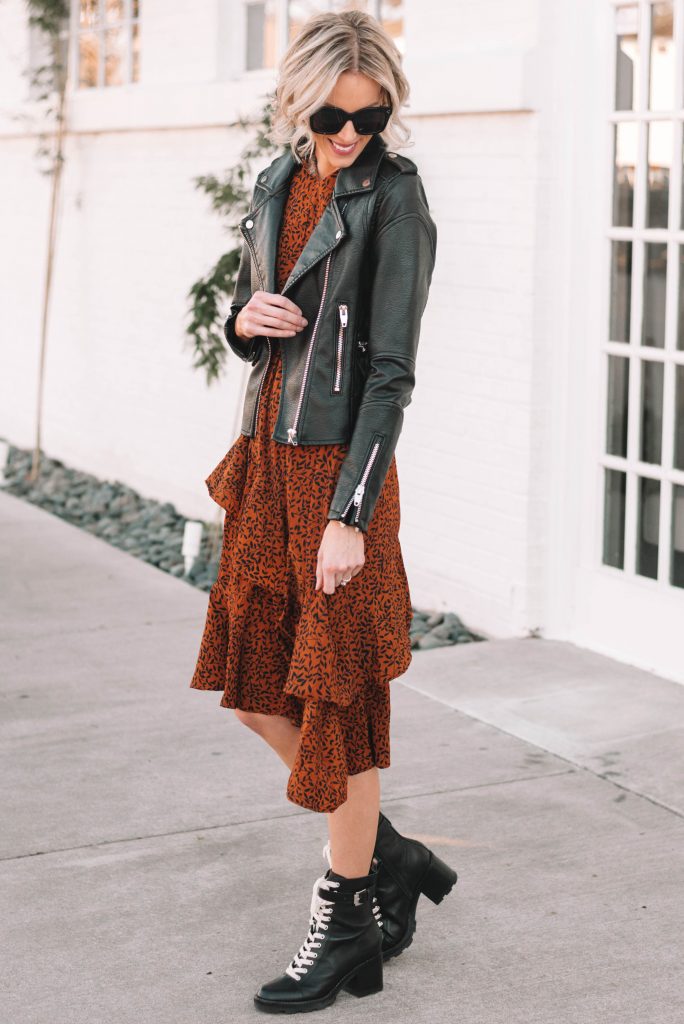 brown ruffle dress with black leather jacket and combat boots
