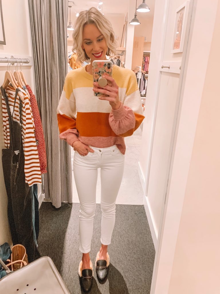 color block sweater with white jeans for spring