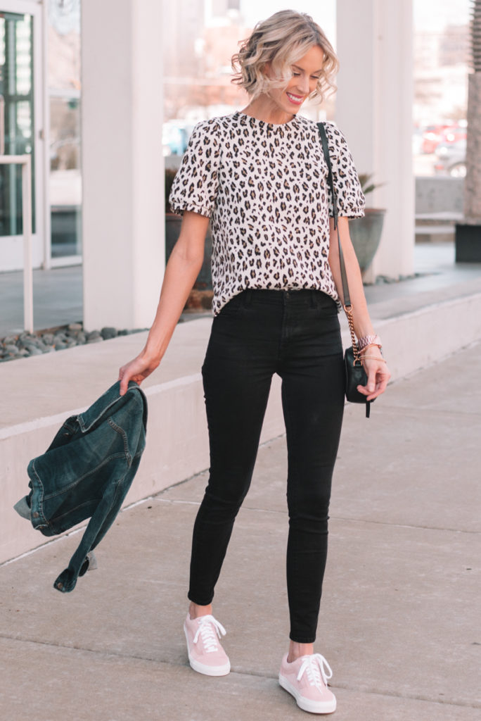 spring outfit idea, leopard top, black jeans, pink sneakers