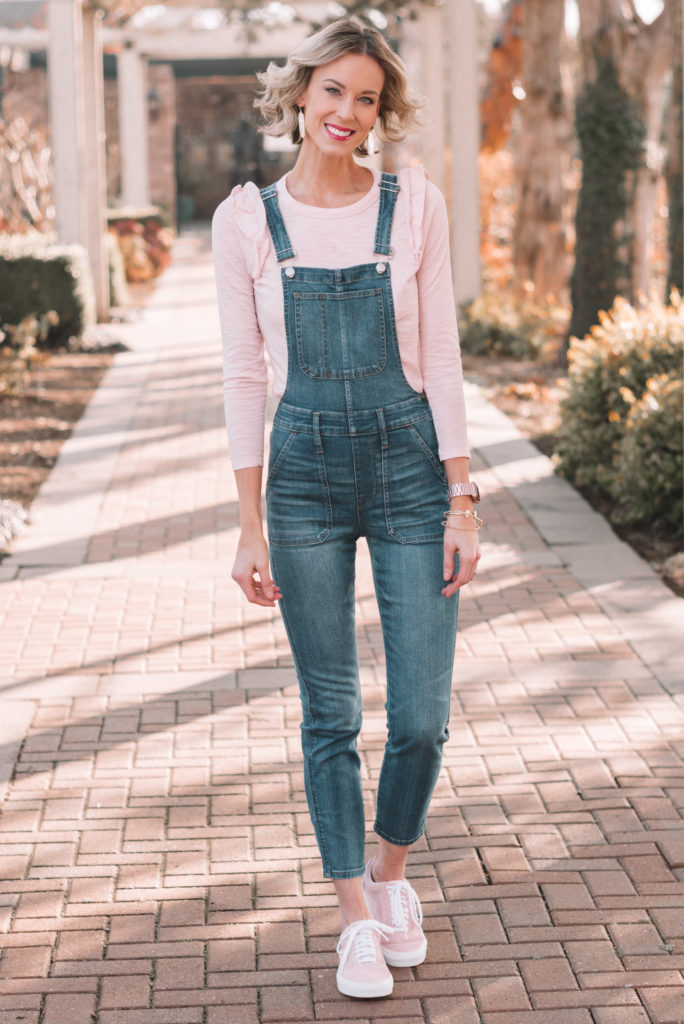 skinny denim overalls for spring with a pink top
