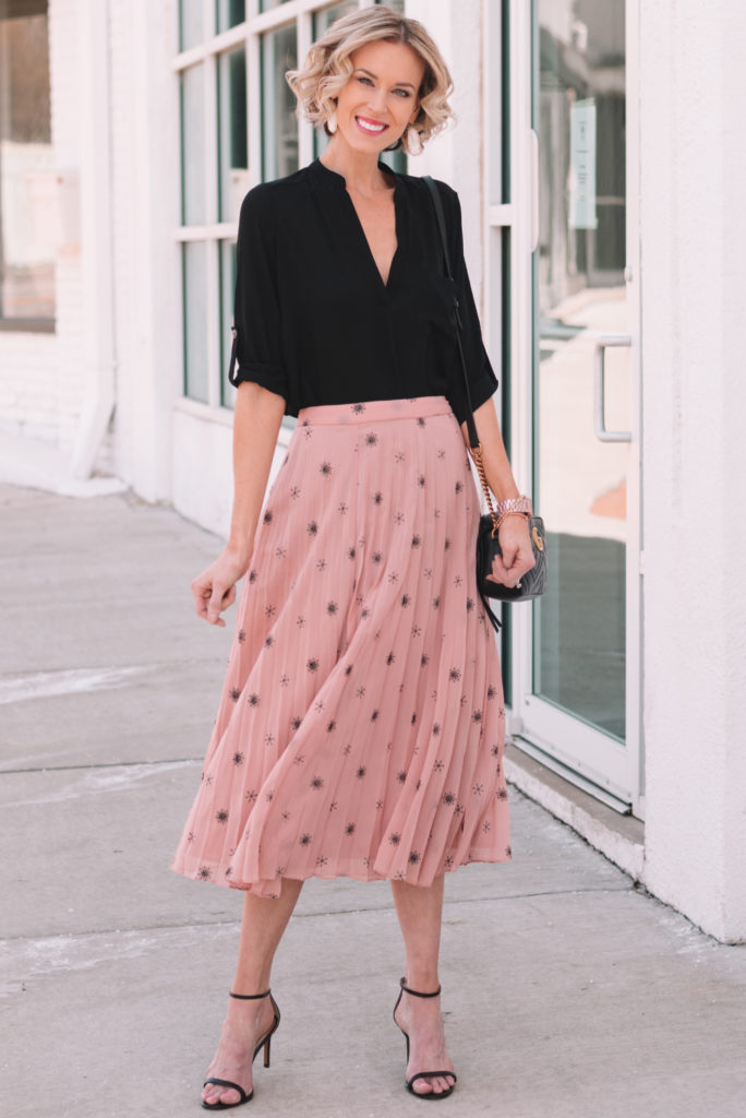 blush pleated midi skirt with black top, dressy work outfit