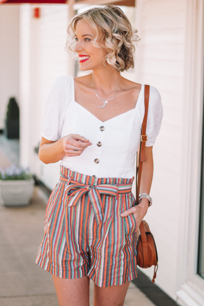 button front white top with rainbow stripe paper bag shorts