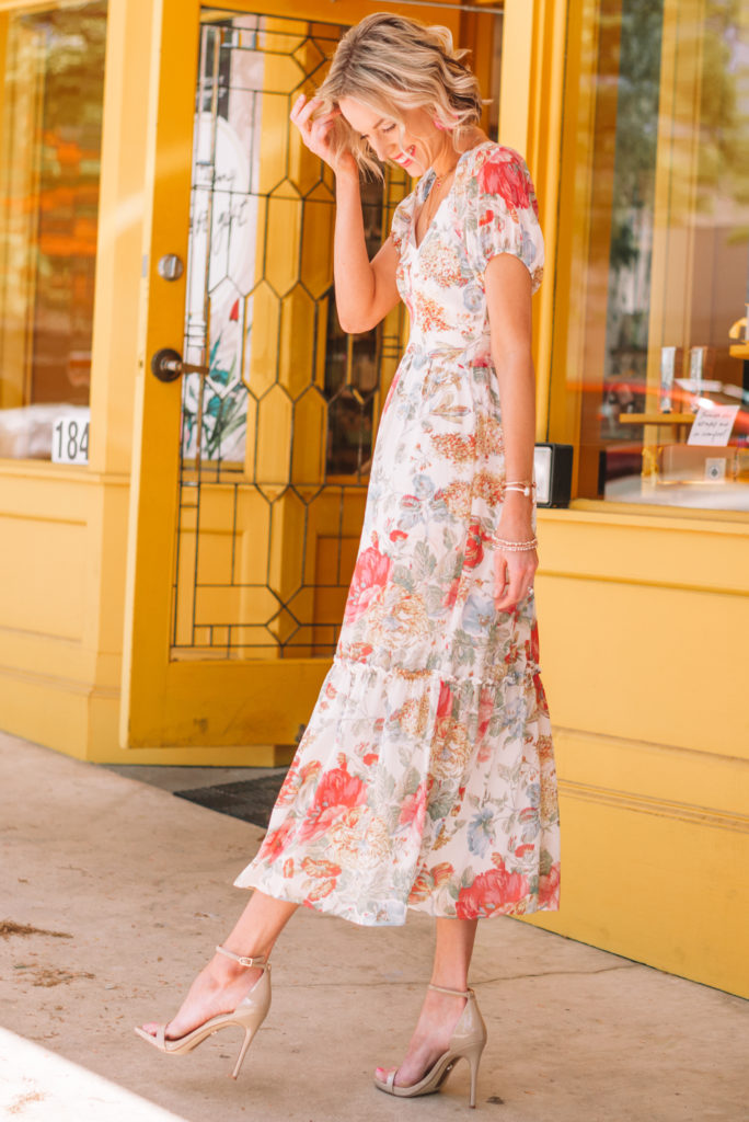 floral dress with short sleeves and nude colored heels