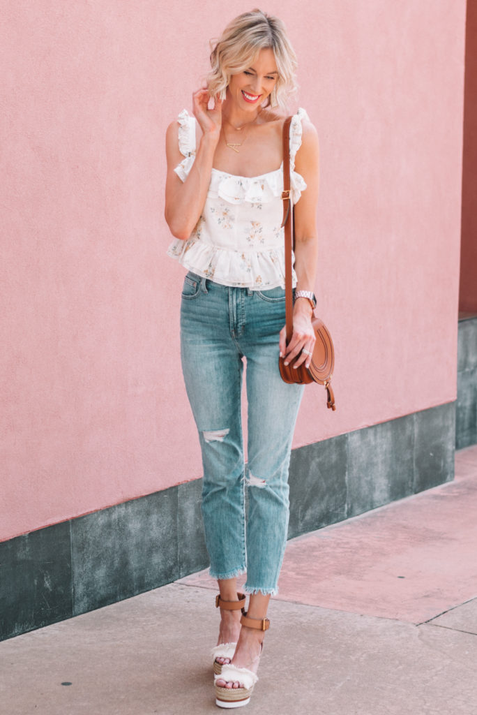 flirty ruffled tank top with cropped jeans and wedges